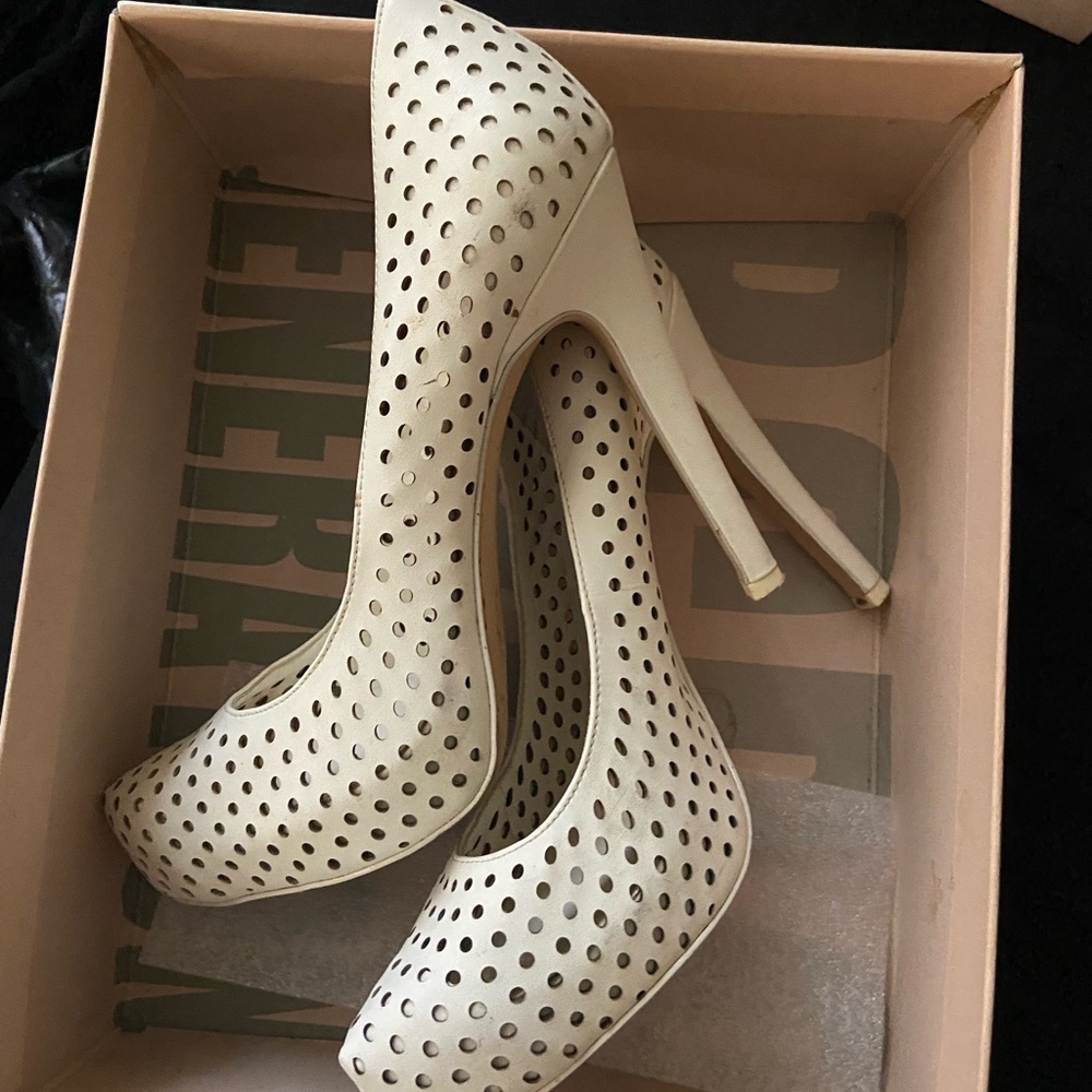 White platform heels , they are beautiful white holes all around